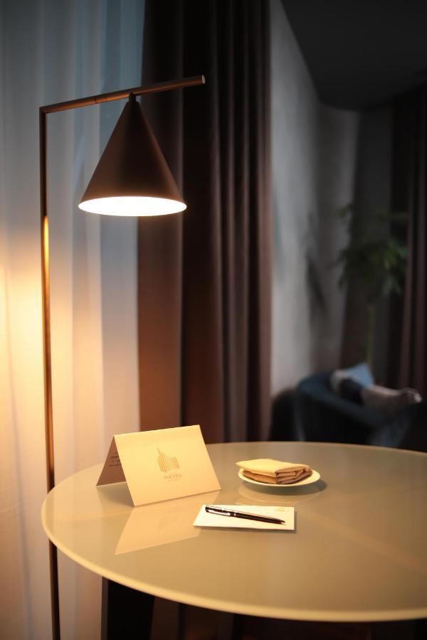 The Veil Hotel أستانا المظهر الخارجي الصورة A floor lamp